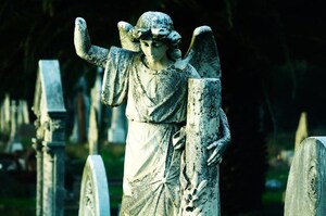 Stone angel in a graveyard