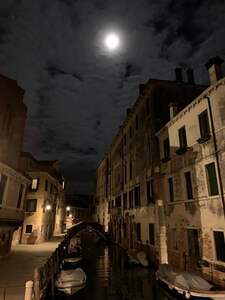 Narrow city street at night