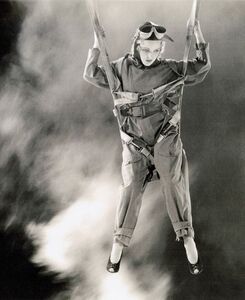 vintage photo of a woman parachuting