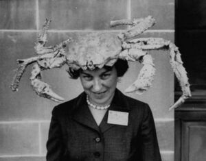 Woman wearing a crab on her head