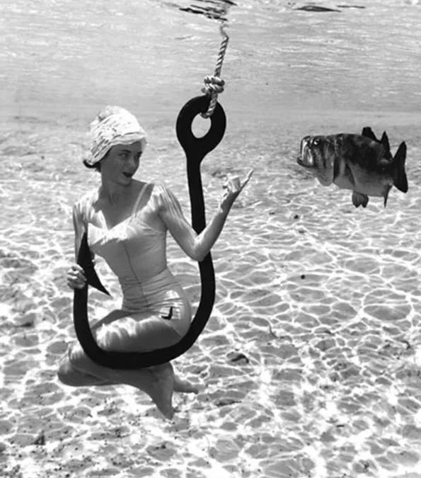 Pisces: The Artist Poses His Muse Before a Goldfish Bowl by Kathryn Kulpa