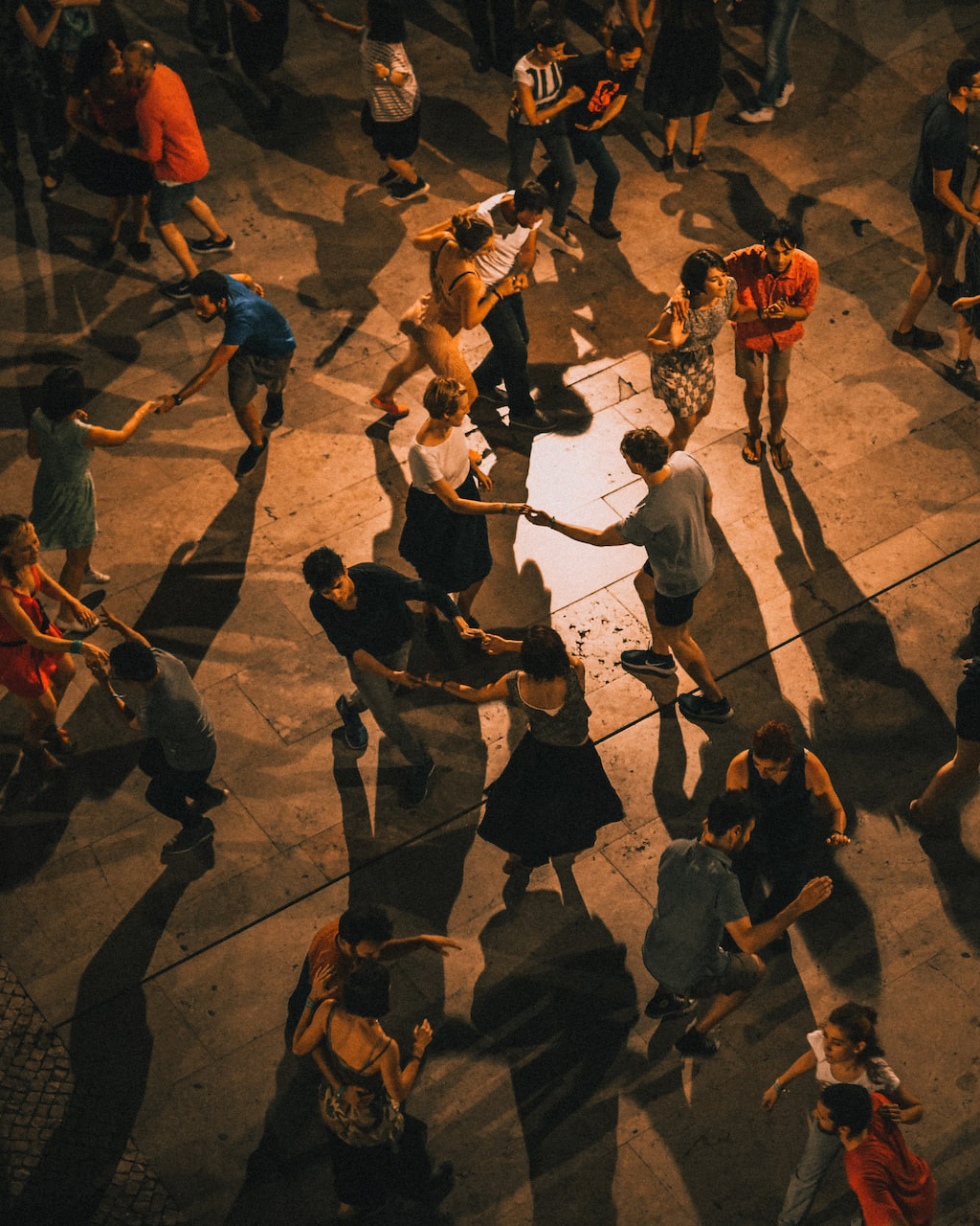 Group of people dancing in public