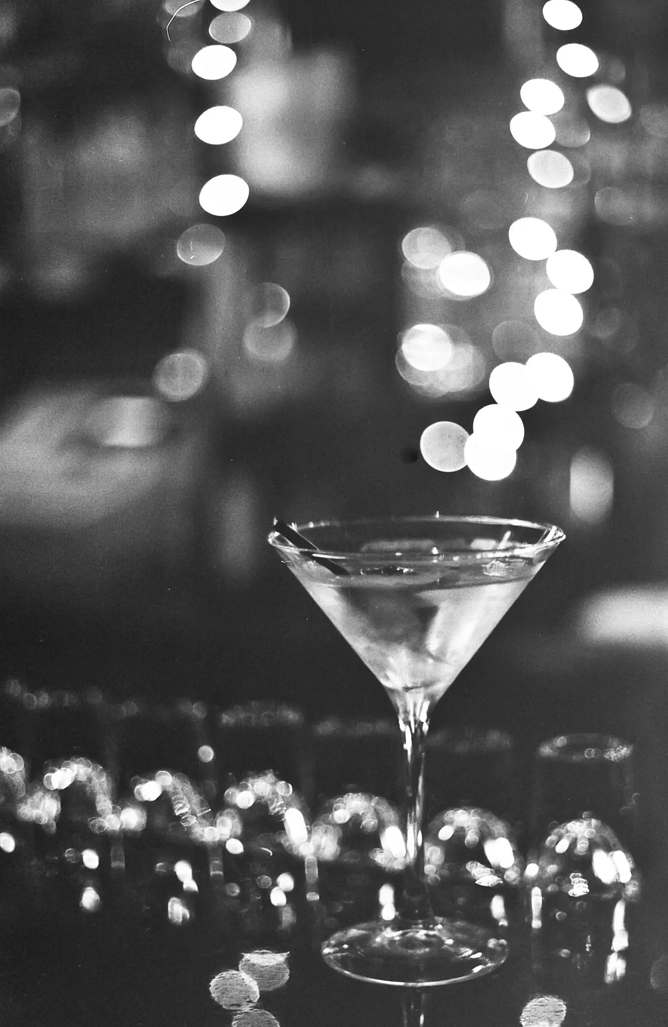 black and white photo of a martini glass