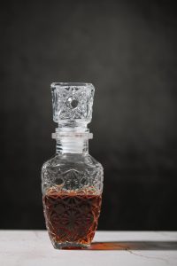 transparent glassware with strong alcohol drink