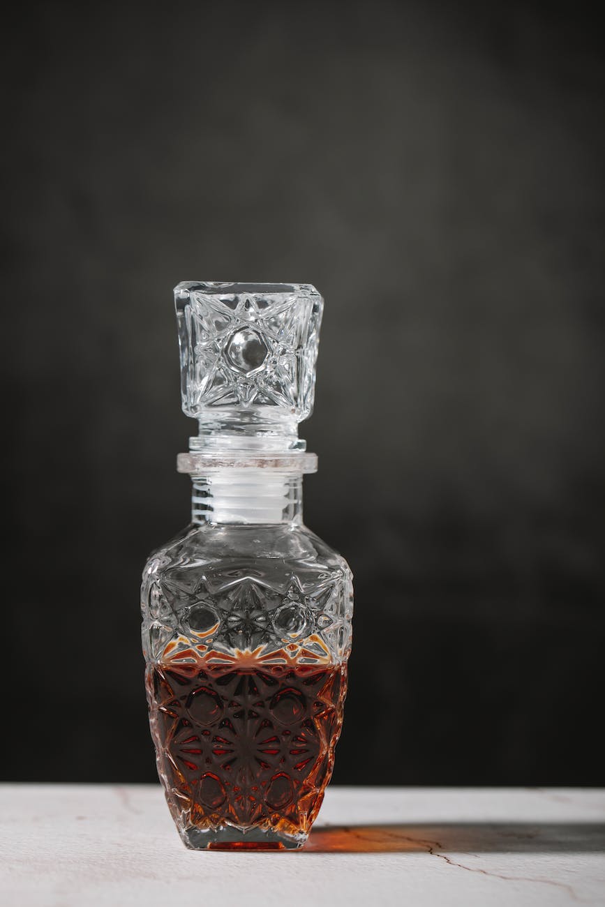 transparent glassware with strong alcohol drink