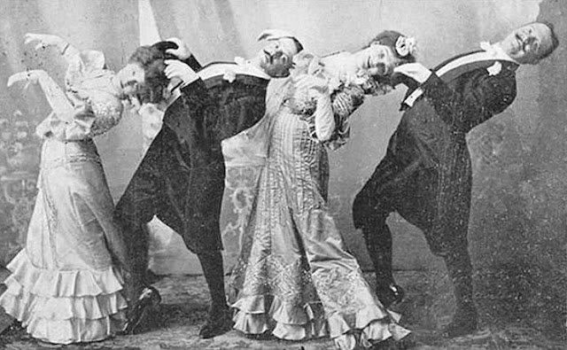 Vintage photo of four people dancing