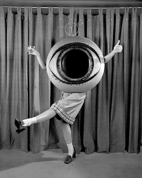 The medium Eva C. forcing a luminous apparition between her hands on May 17, 1912.