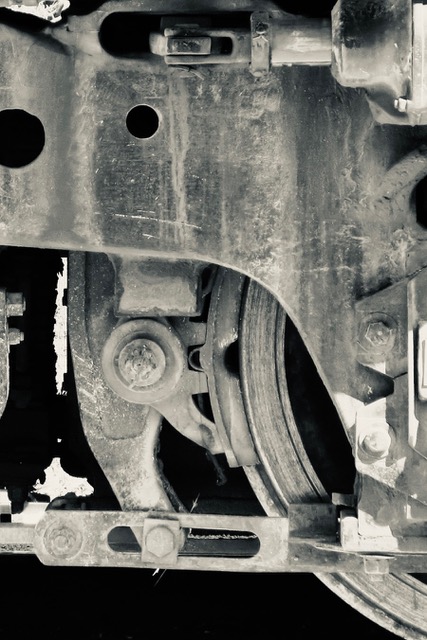 close up of the wheels of a train