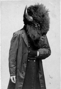 Person with a buffalo head
