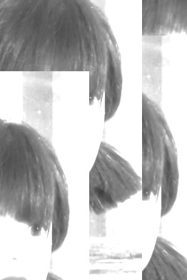 cut.1 Black-and-white abstract photo of a fragmented face with dark bobbed hair, split apart by vertical white bars for a collage-like effect.